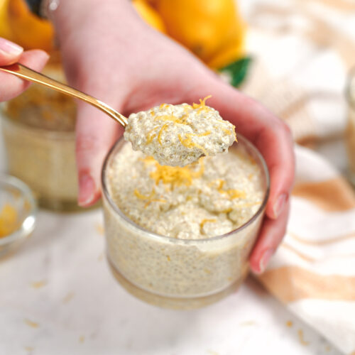 High-Protein Cottage Cheese Lemon Chia Pudding 12 Spoonful of high-protein cottage cheese lemon chia pudding topped with fresh lemon zest, showing its thick and creamy texture.