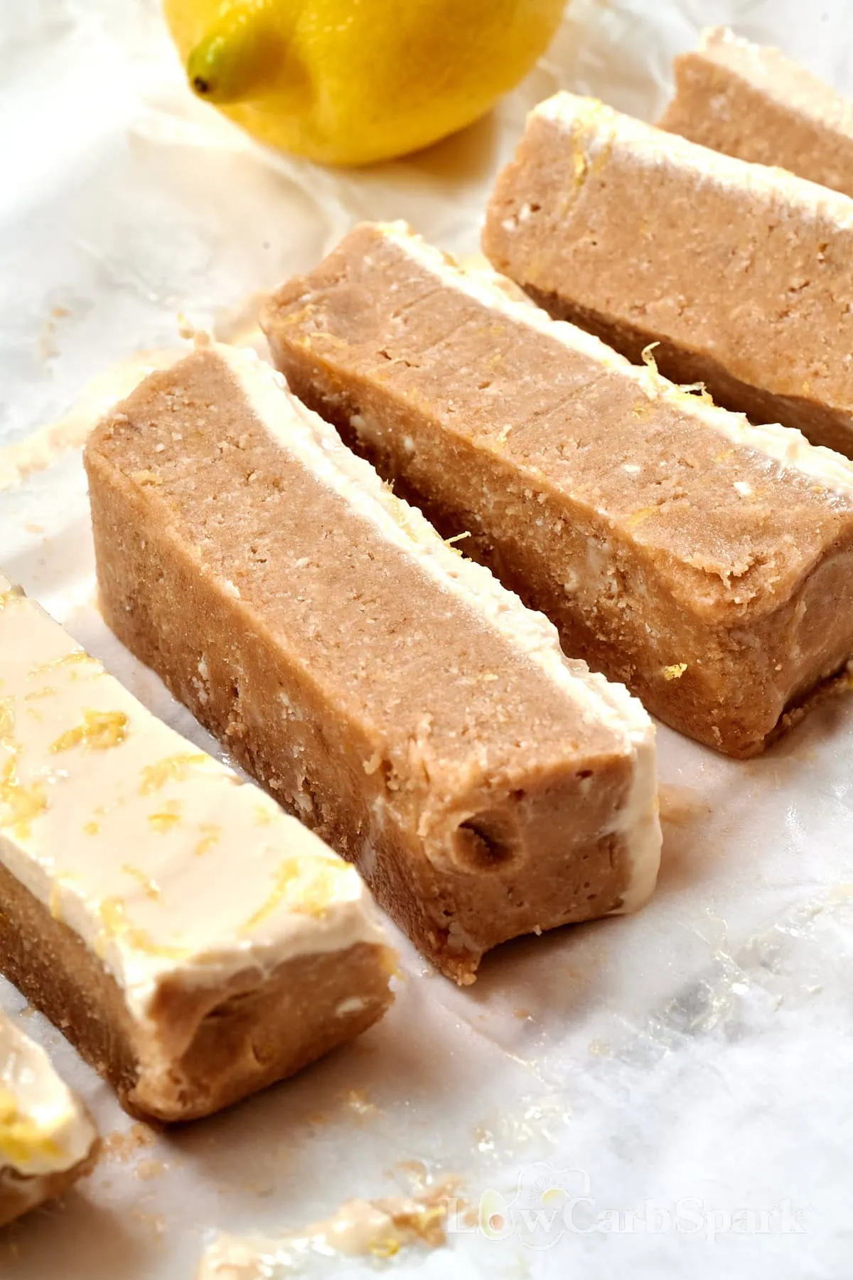 Lemon Cottage Cheese Protein Bars 1 Sliced lemon cottage cheese protein bars before frosting, showing their soft, dense texture.