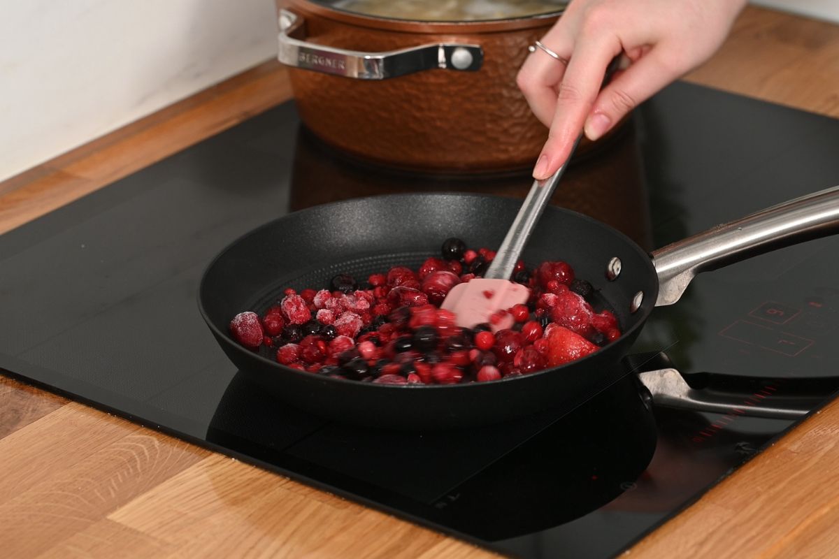 Cottage Cheese Lemon Cheesecake 9 Cooking frozen mixed berries in a skillet to make a homemade berry topping for lemon cheesecake.