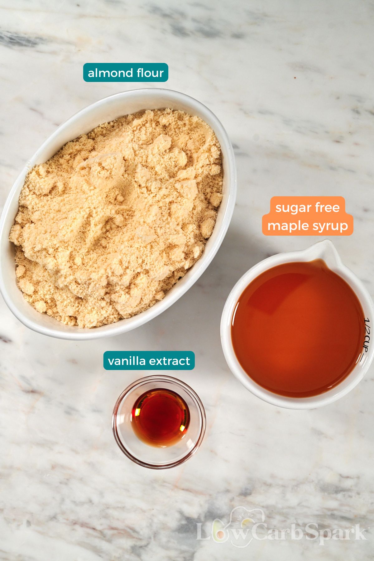 2 Ingredient Almond Flour Cookies 3 Ingredients for 2 ingredient almond flour cookies: almond flour, maple syrup and vanilla extract in small bowls