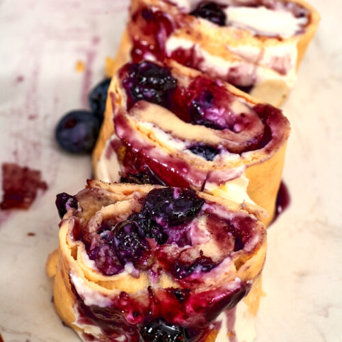 Cottage Cheese Blueberry Roll 15 Sliced high protein cottage cheese blueberry roll filled with creamy cheese and juicy blueberry filling.