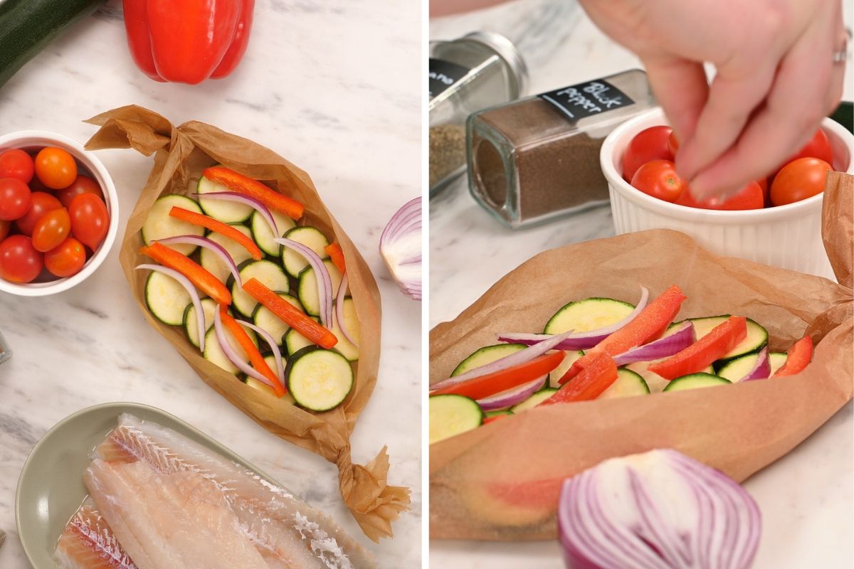 Mediterranean Baked Fish Boats 5 Filling a parchment paper boat with sliced zucchini, red bell pepper, red onion, and cherry tomatoes.