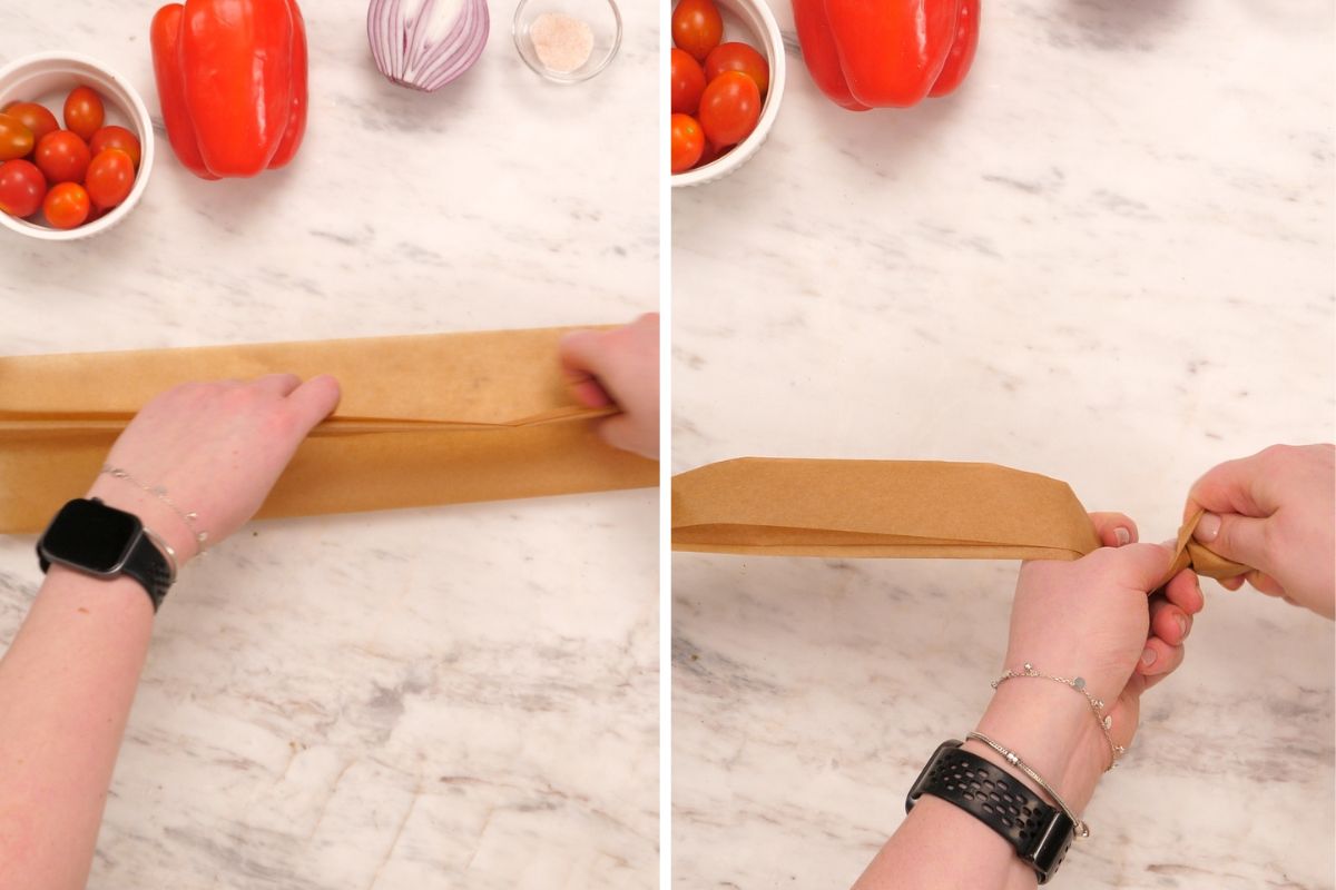 Mediterranean Baked Fish Boats 3 Folding and twisting parchment paper to form a boat for Mediterranean baked fish and vegetables.