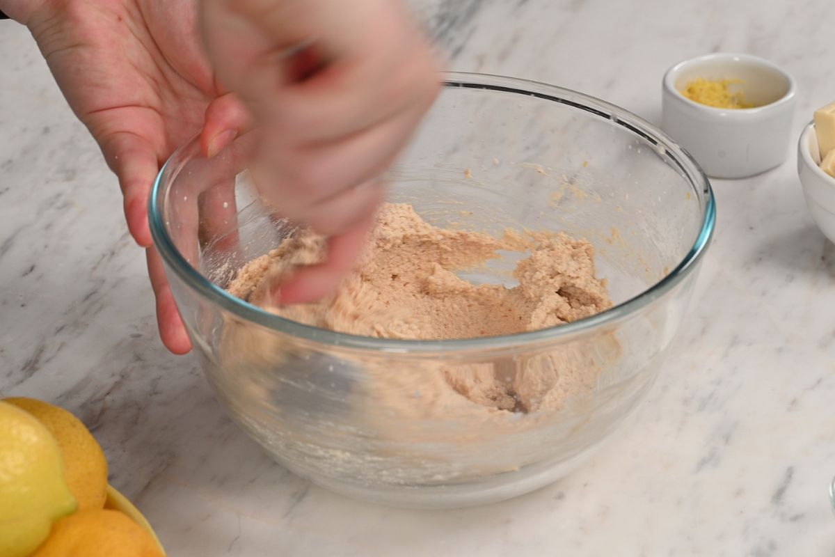Lemon Cottage Cheese Truffles 5 Mixing the lemon cottage cheese truffle mixture in a glass bowl until thick and well combined.