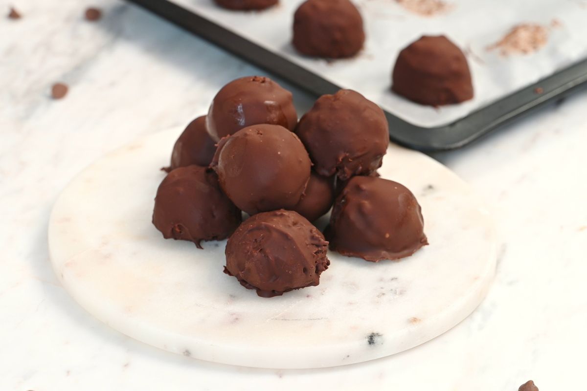 Chocolate Cottage Cheese Truffles 12 Homemade Chocolate Cottage Cheese Truffles coated in chocolate and ready to serve.